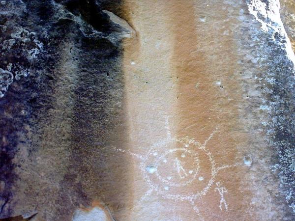 Indian Writings. Those large gray holes, are bullet holes from some early cowboy's target practice.